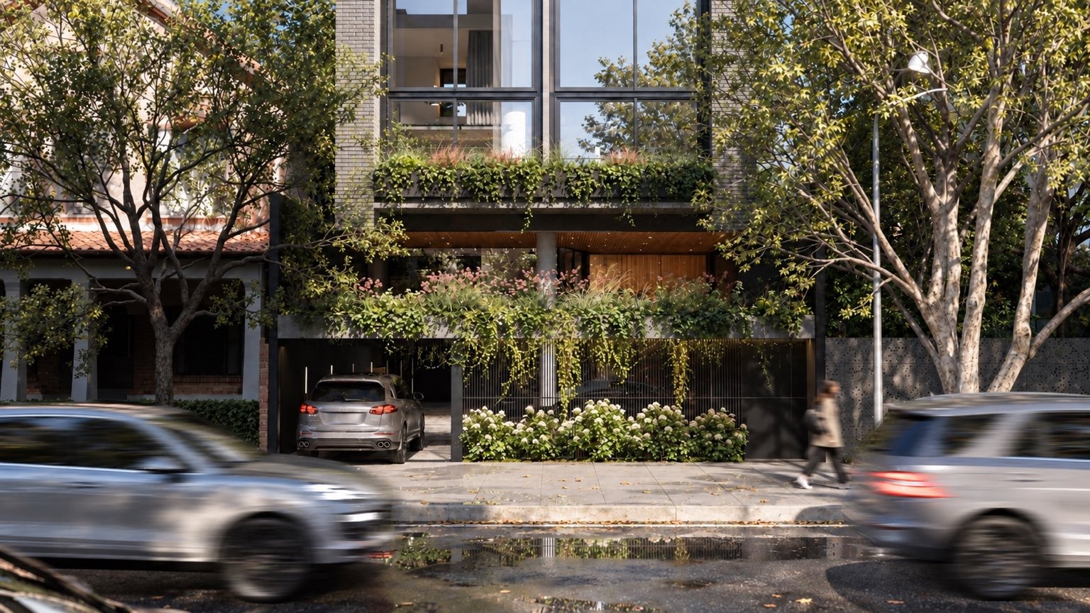 Fachada de un desarrollo de Marzano Architects, con balcones y vegetación